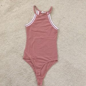 Salmon colored body suit